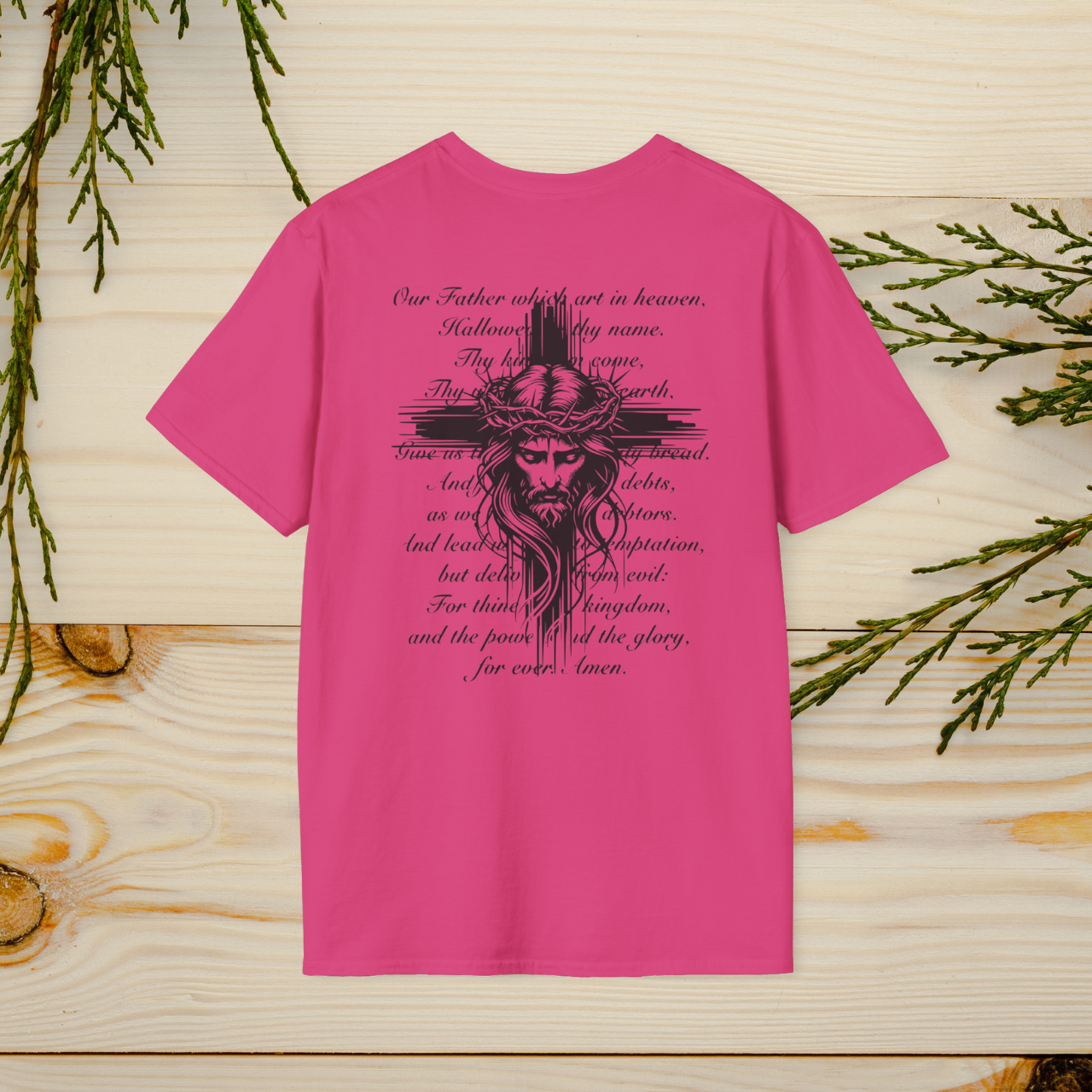 The Lord's Prayer T-Shirt features a striking Jesus design with the full text of the prayer, combining faith and style. A wearable reminder of devotion and spirituality, perfect for any occasion.